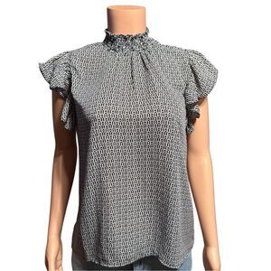 Alex & Lili high-neck ruffled blouse with a black and white geometric pattern. M